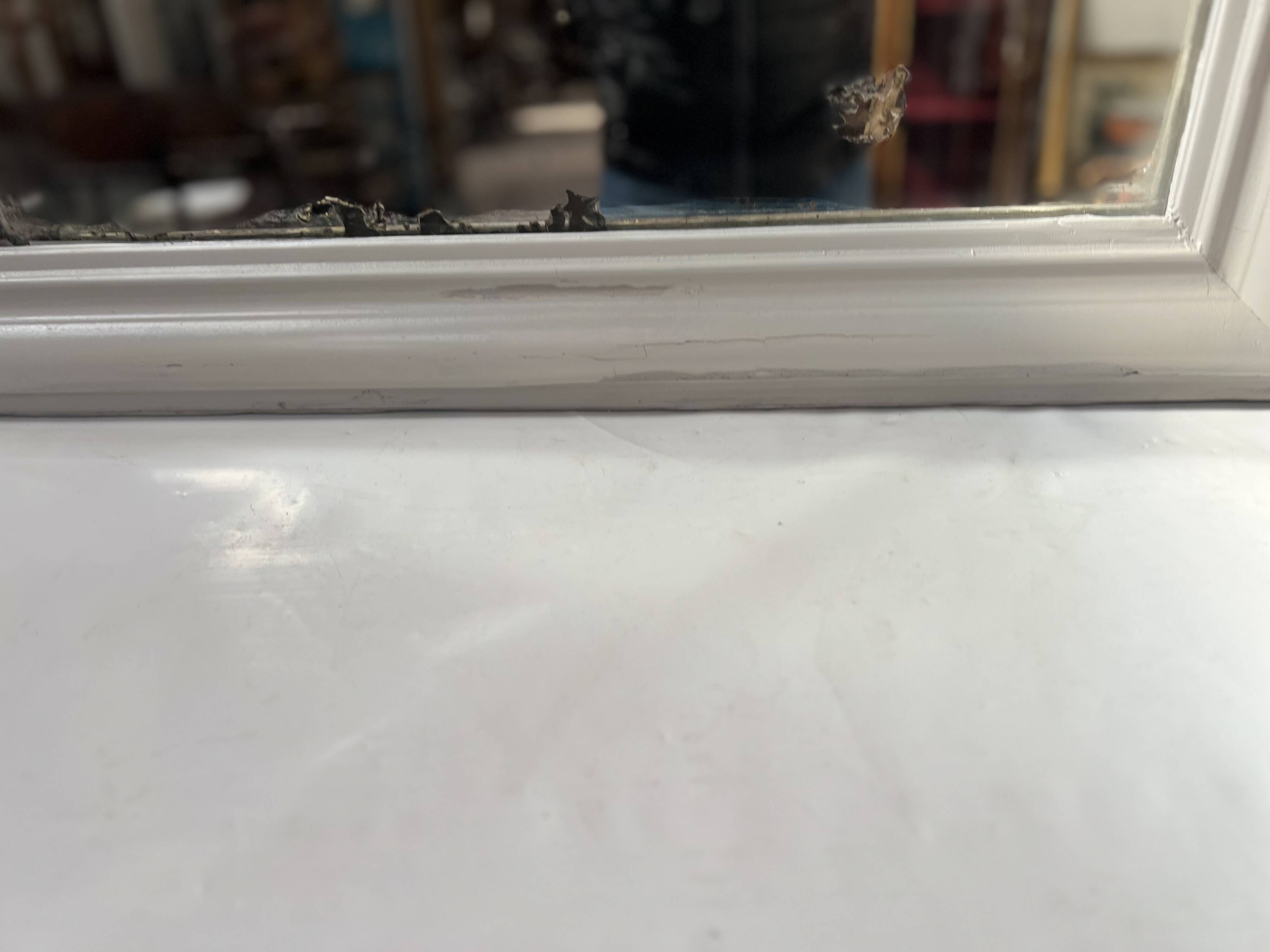 Louis Philippe mirror in wood and patinated stucco, 19th century