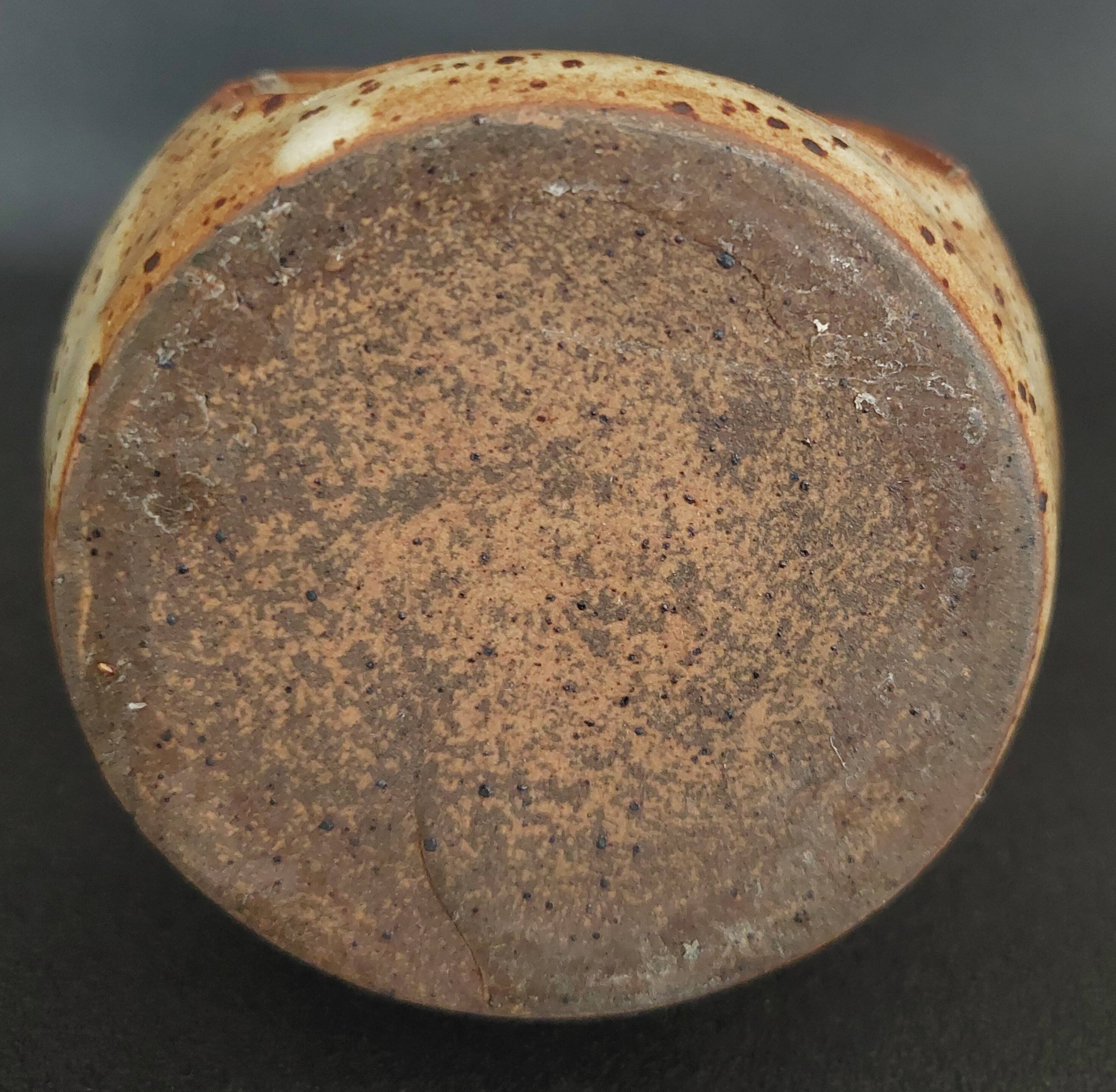 20th century pyrite stoneware tea light holder