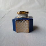 Ink in blue and white earthenware with floral decoration