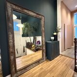 Very large mirror with a vintage effect.