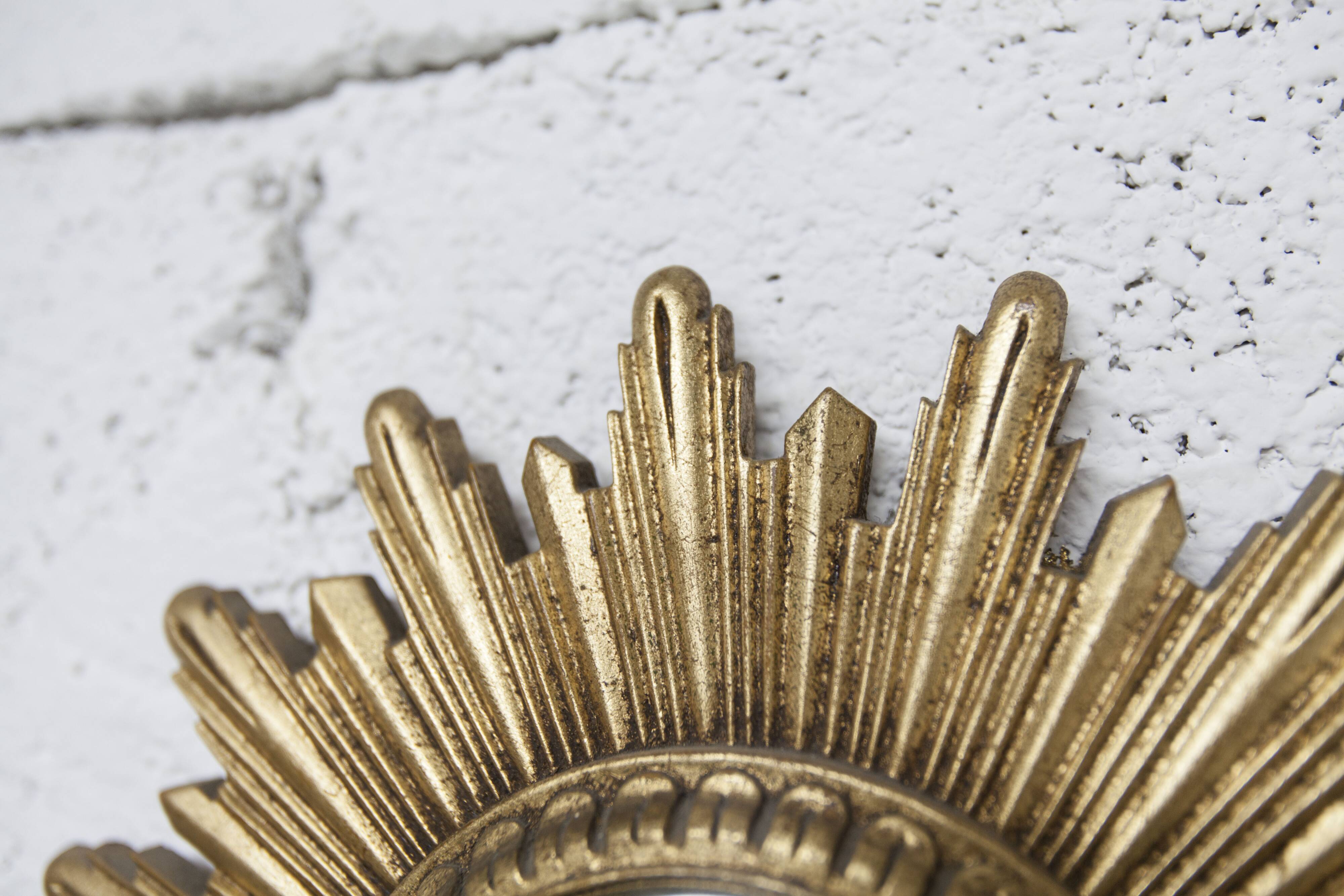 Vintage 1970s convex witch's eye sunburst mirror