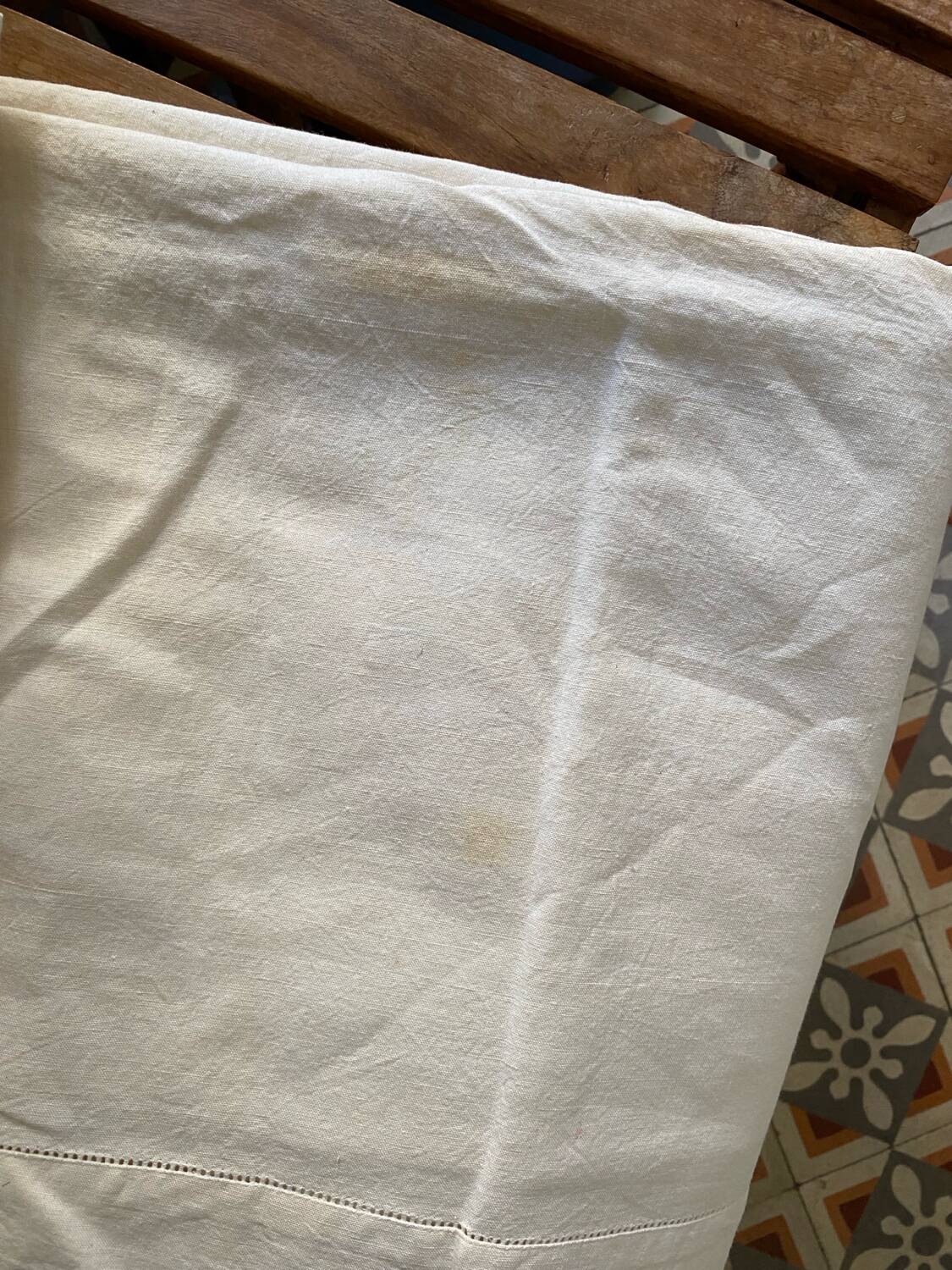 Drap en metis monogramme HG.
