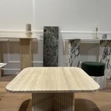 Square coffee table in striated travertine