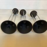 Trio of vintage black candlesticks