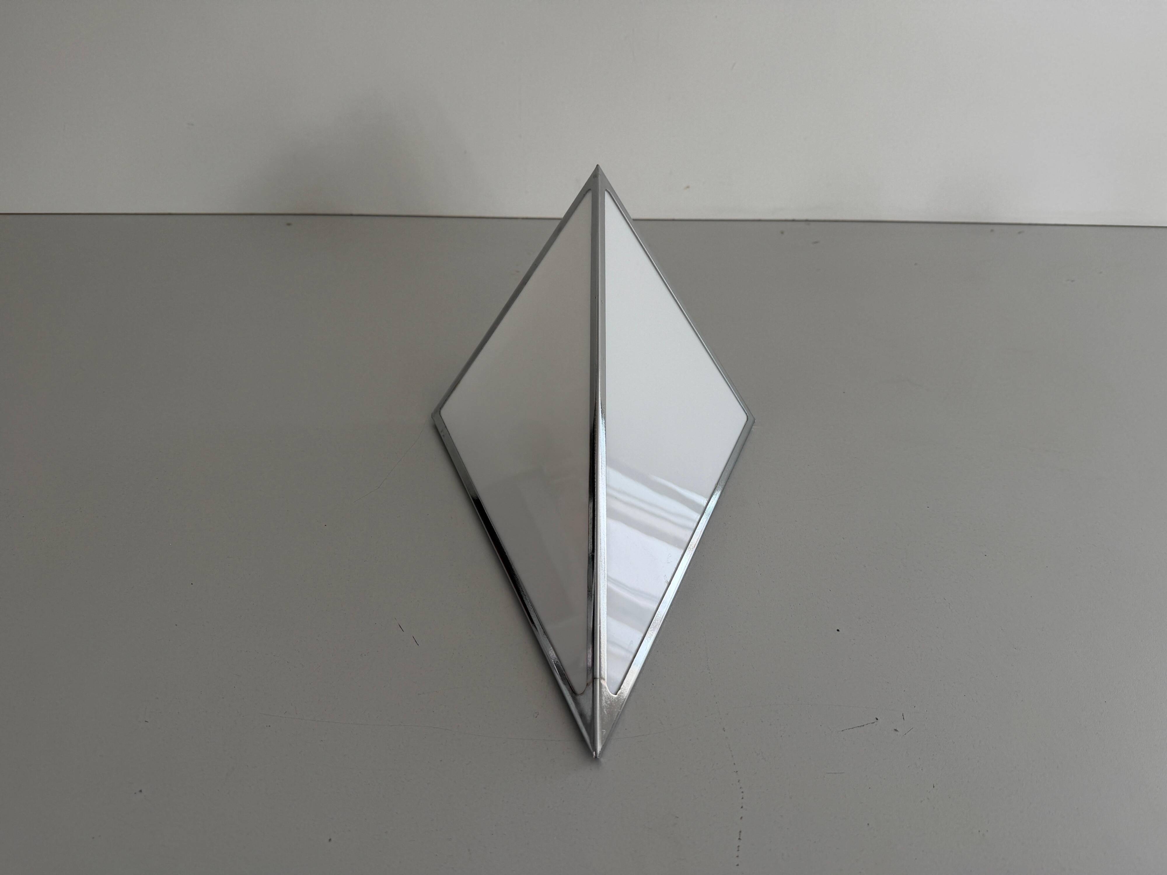 Simple opal glass wall light with an aluminium body, 1980s, Germany.