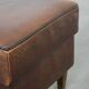 Sturdy vintage sheepskin ottoman in a beautiful large size with black piping