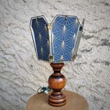 Table lamp, old turned wooden foot, metal lampshade and art deco print