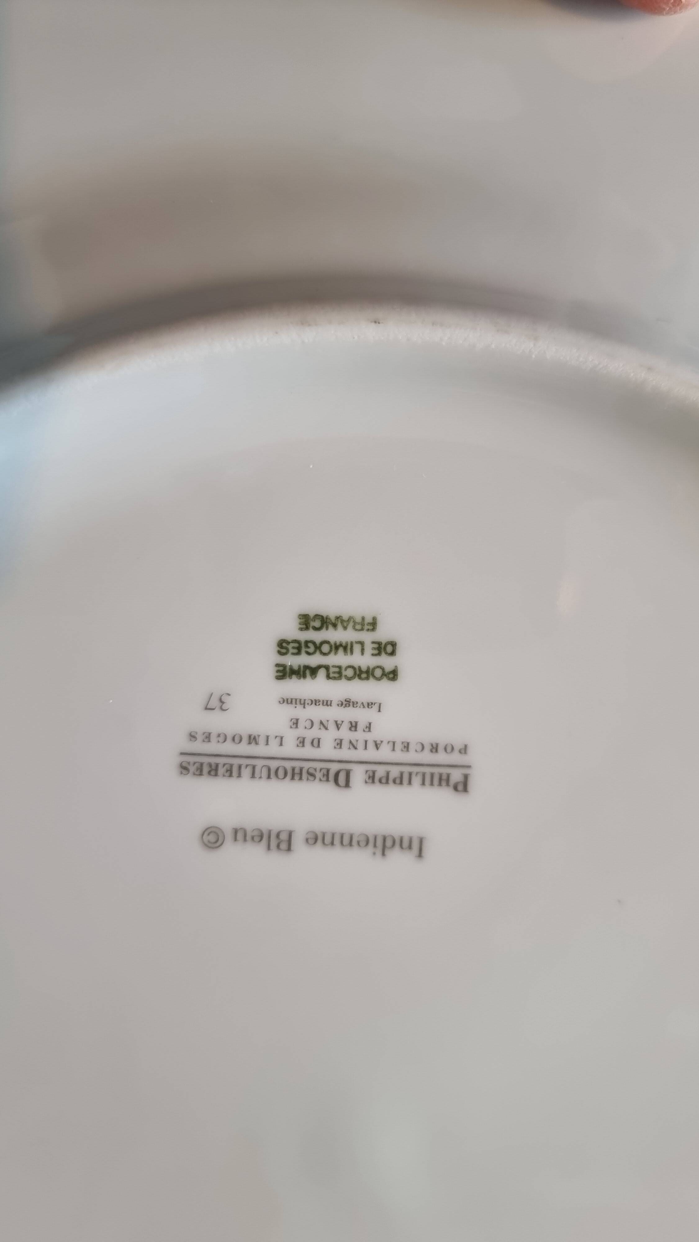 18-piece porcelain dinnerware set from Limoges by Philippe Deshoulières.
