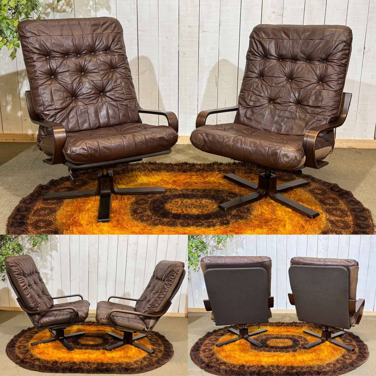 Pair of Norwegian swivel armchairs in leather and beech from the 1970s.