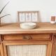 Classic vintage buffet with 3 doors in wood and raffia.