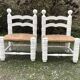 Duo de chaises vintage paillées par Charles Dudouyt.