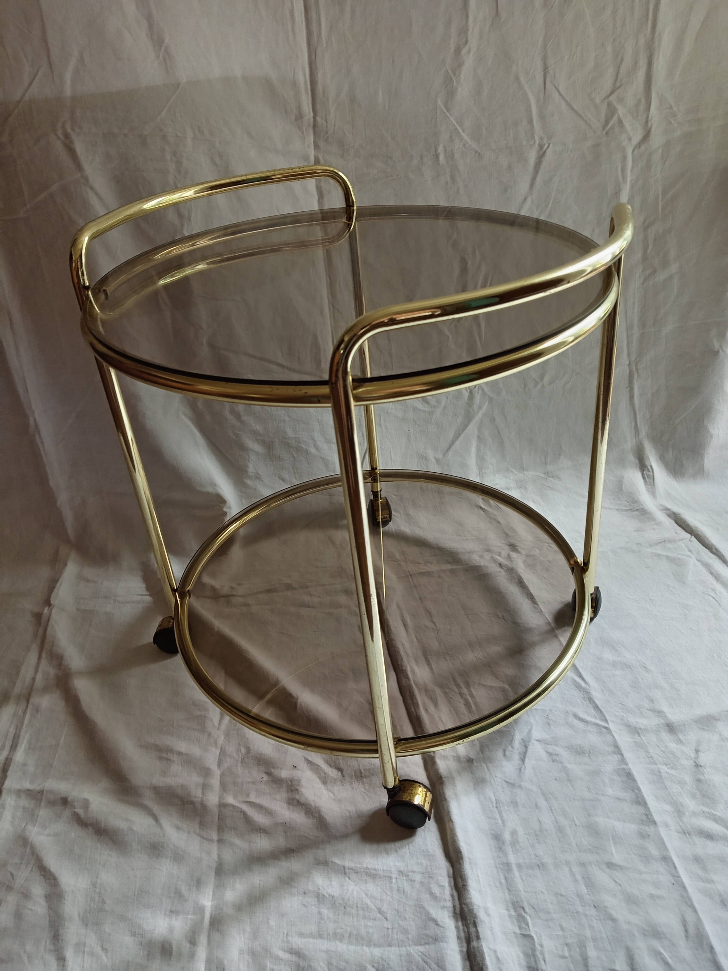 Vintage serving trolley with smoked glass from the 1970s