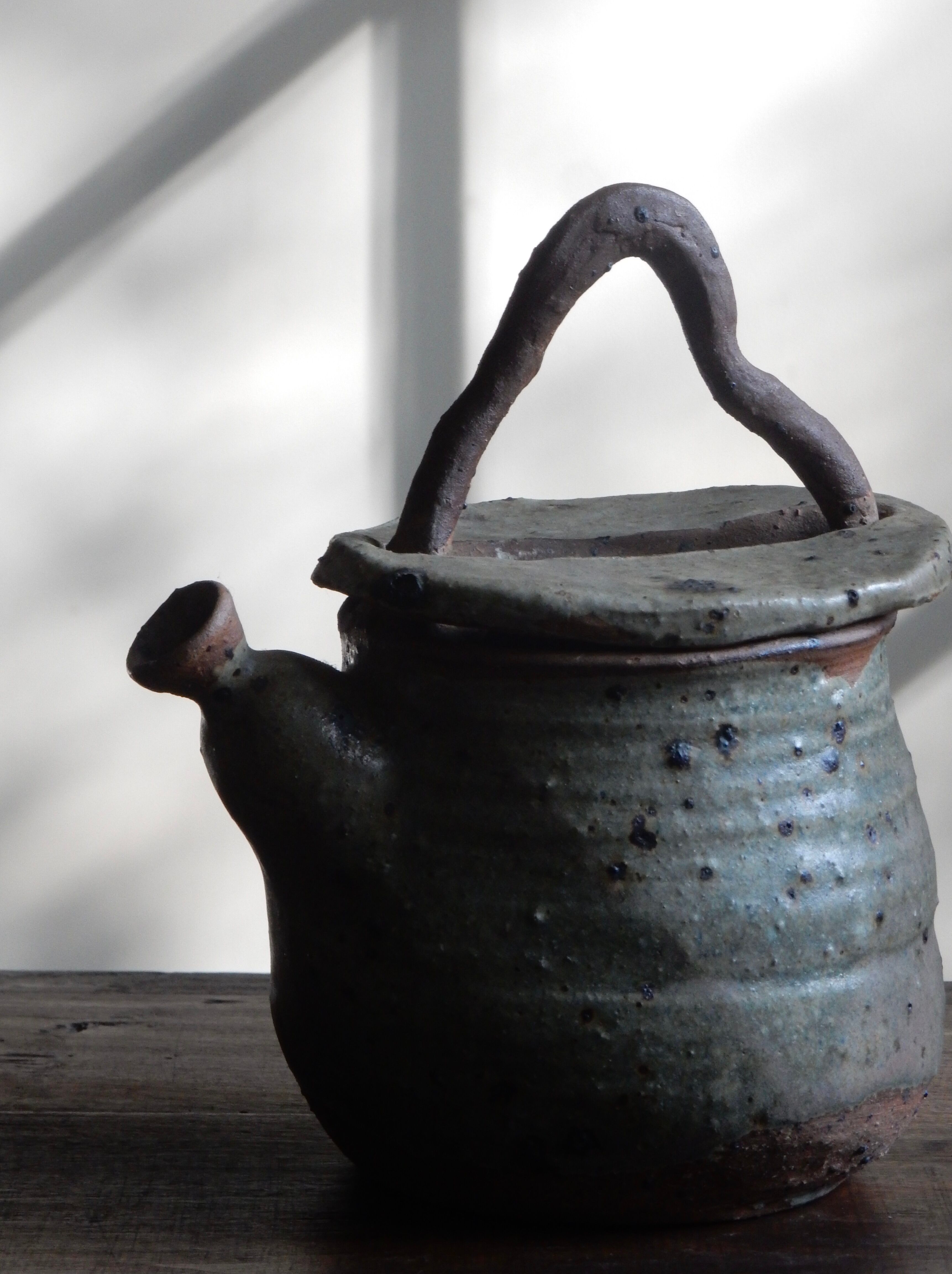 Homemade teapot in pyrity sandstone