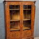Bibliothéque galbée style Louis XV en bois de rose et marquéterie 1950
