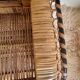 Woven rattan and wicker shelf mirror in the Emmanuelle style, Spain, 1970s.
