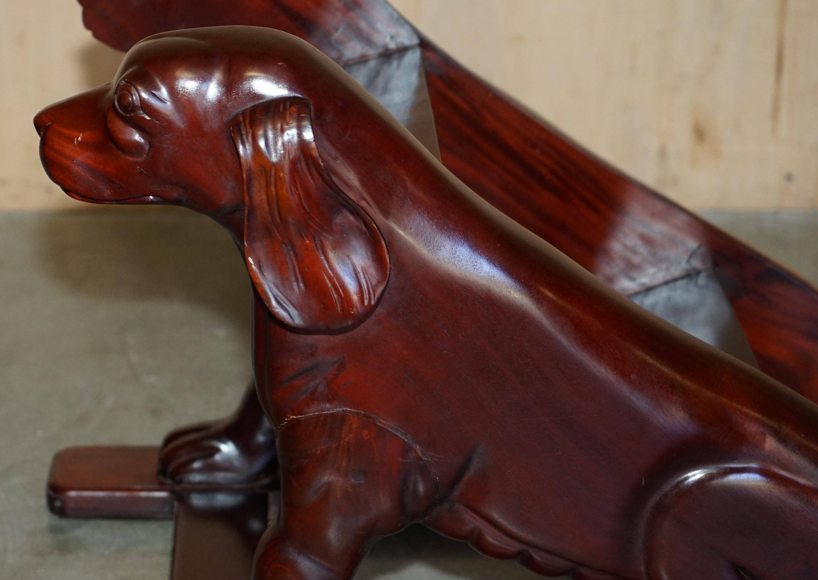 Pair of hardwood library steps with carved dogs, Regency style.