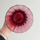 Translucent glass vase on a stand