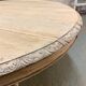 Table Henri II à pattes de lion en chêne brut extensible .