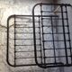 old bed with vintage painted metal bars