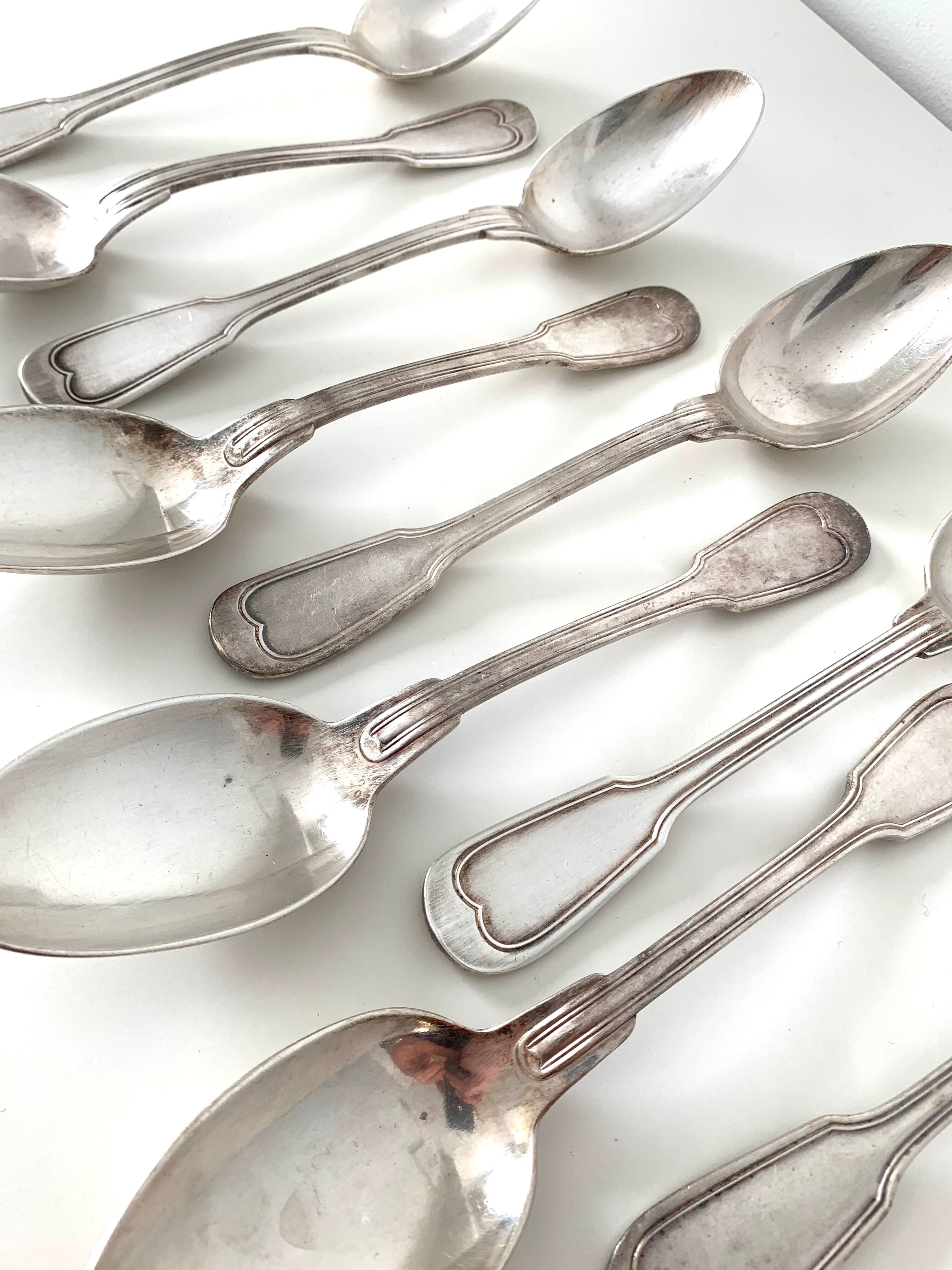 10 silver metal spoons