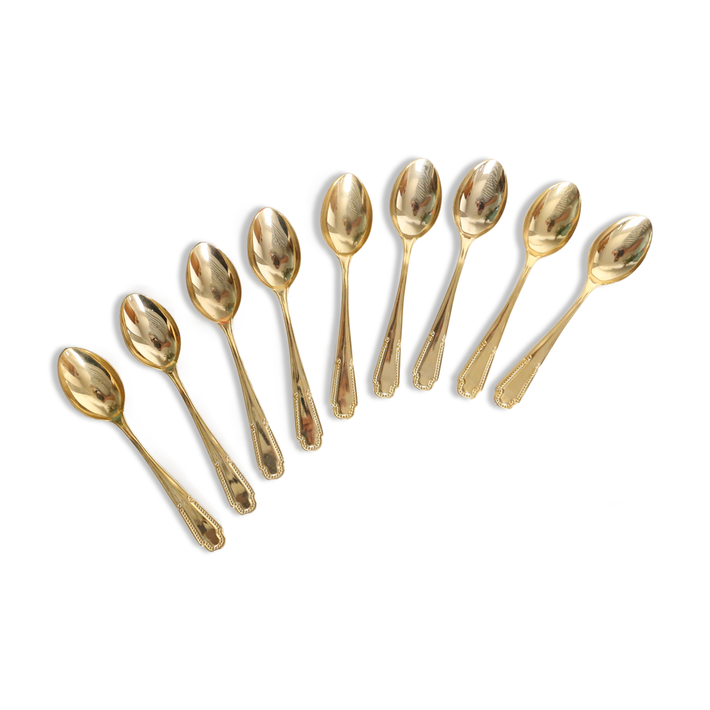 Service of 9 small golden spoons, vintage
