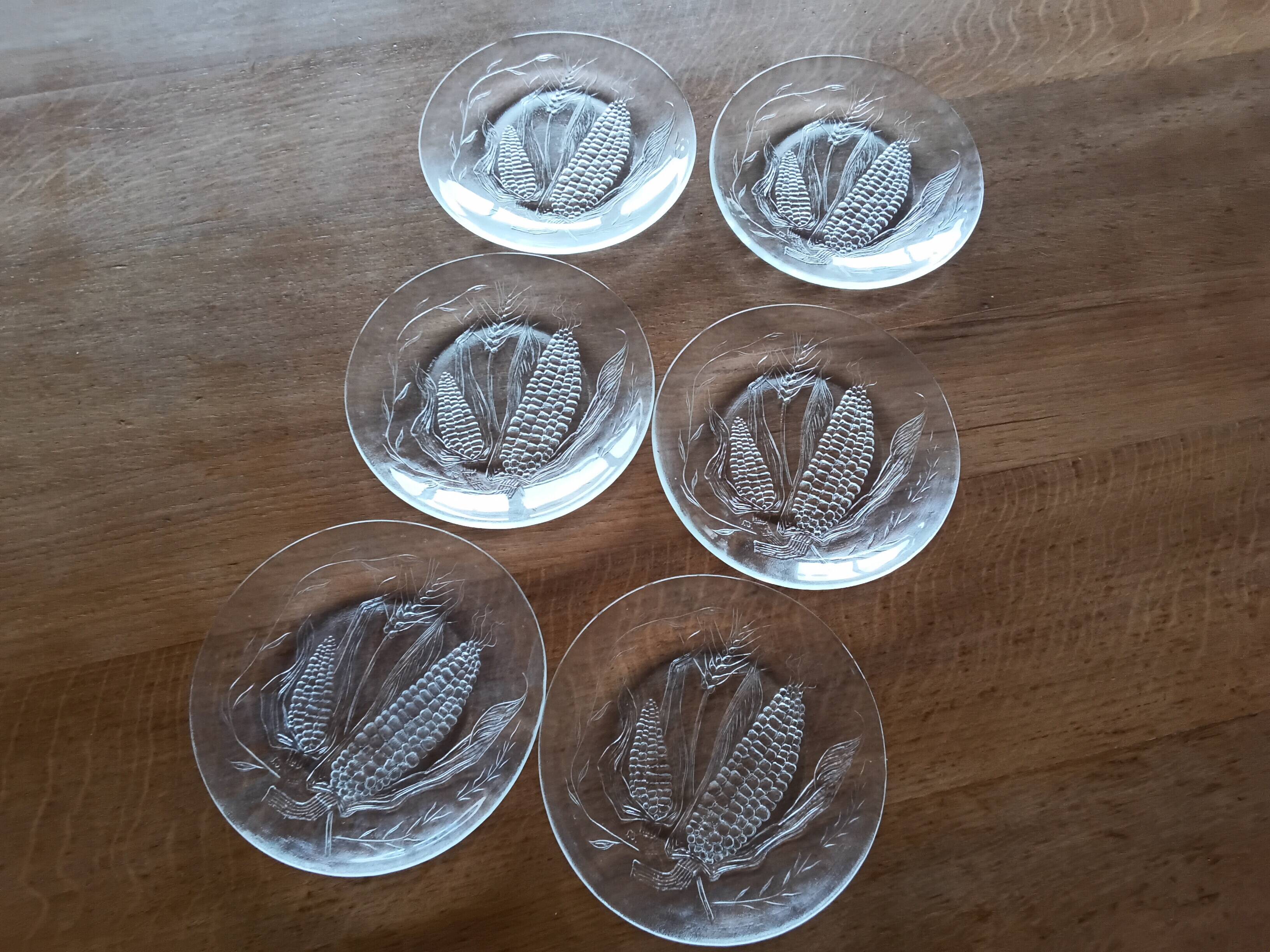 Set of six Duralex dessert plates.