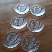 Set of six Duralex dessert plates.