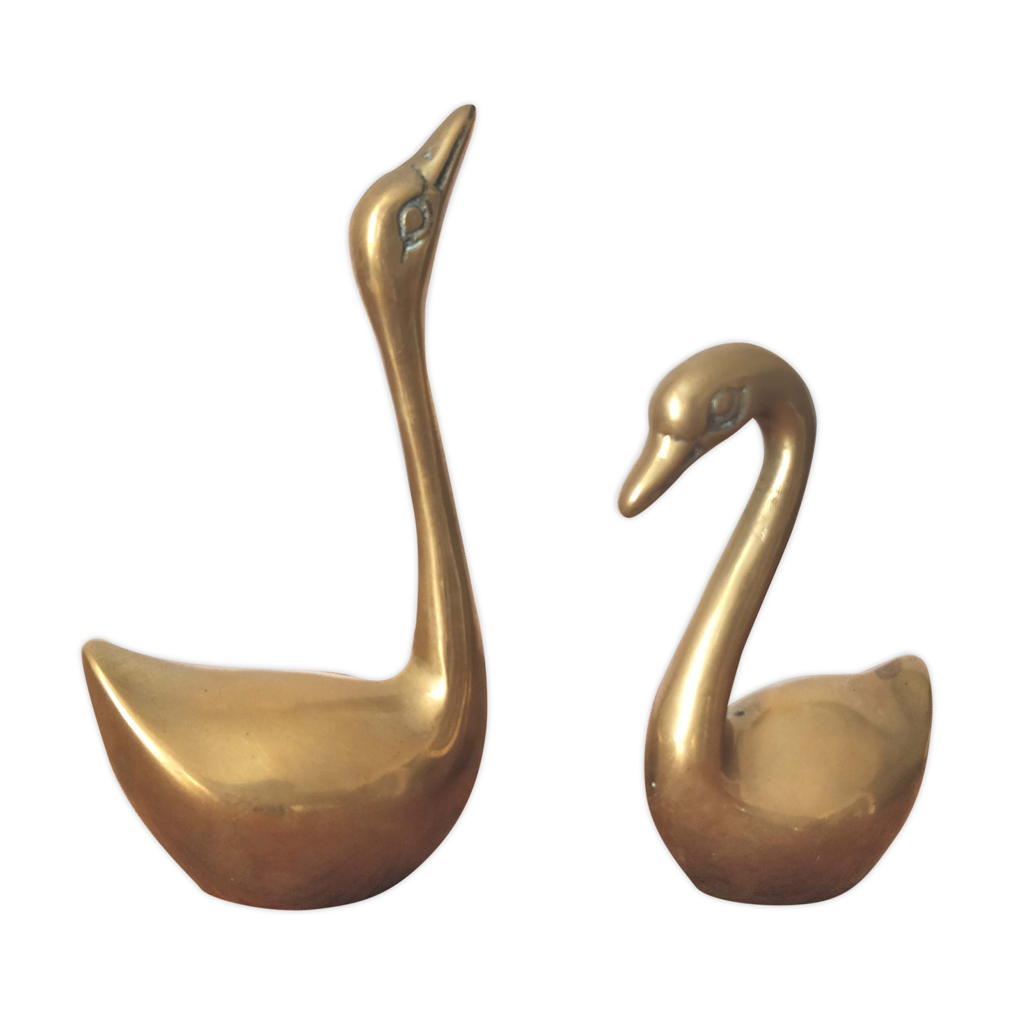 Couple of brass swans