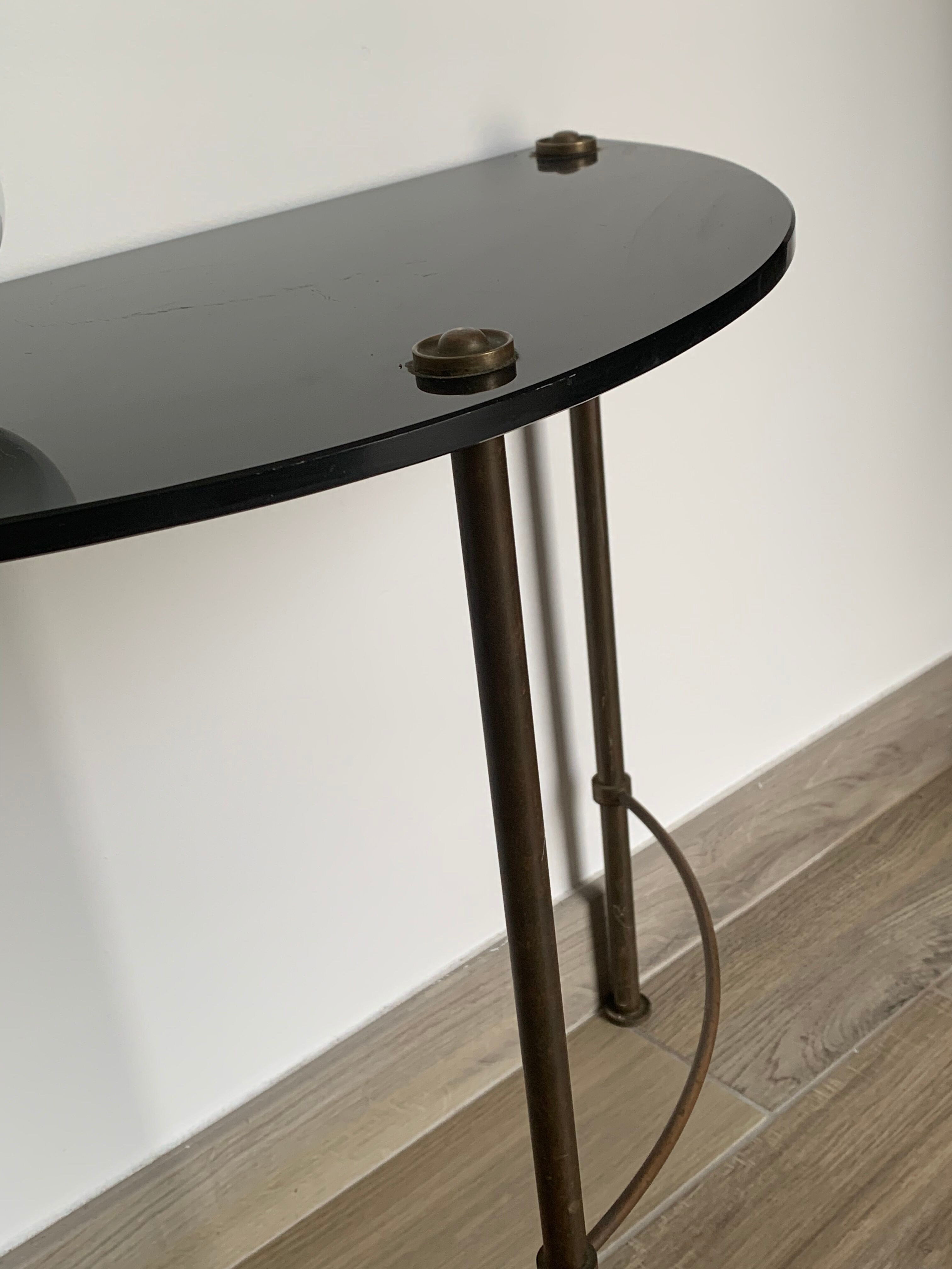 Half-moon console in glass and brass