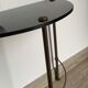 Half-moon console in glass and brass