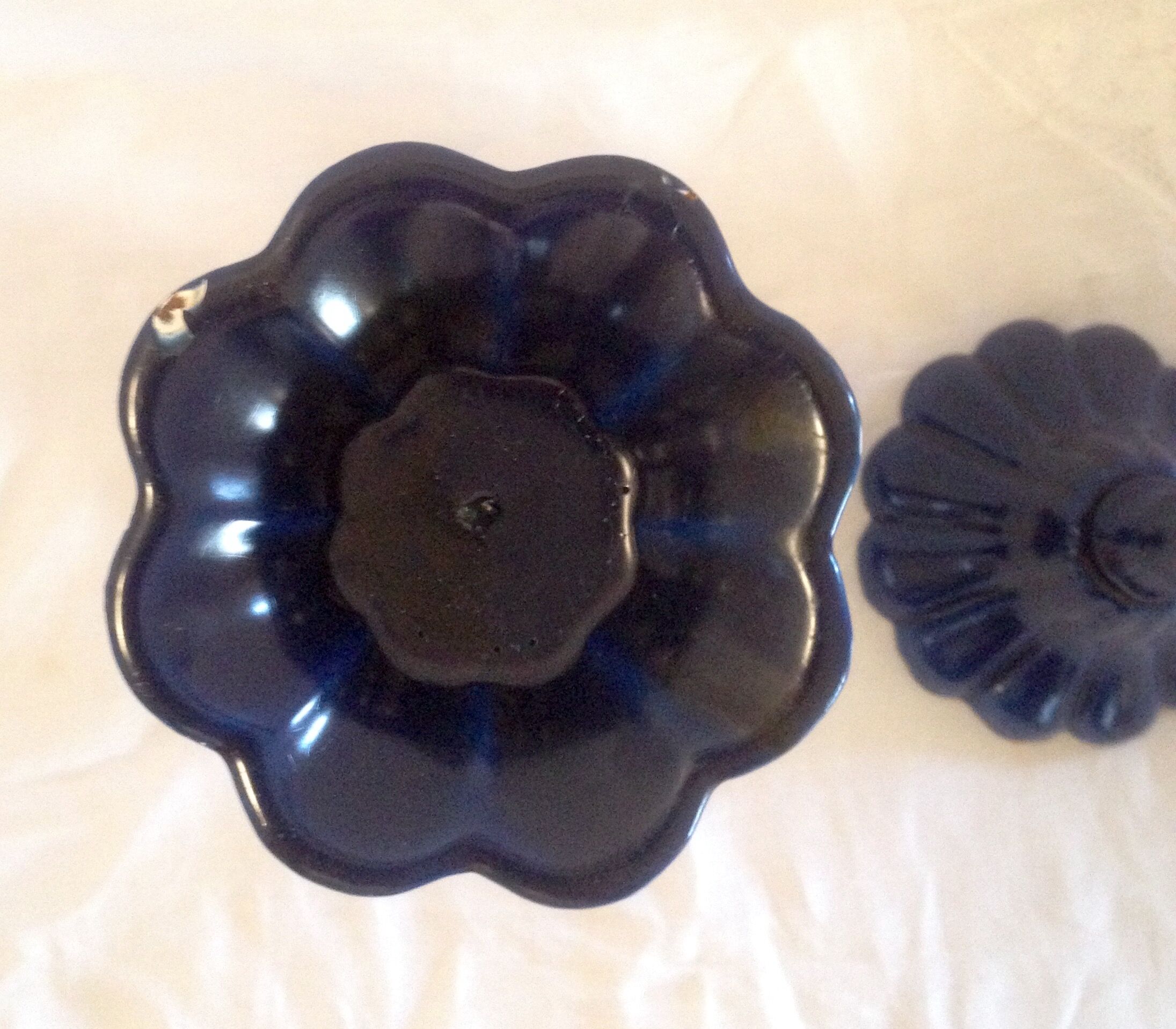 Vintage enameled cast-iron candleholders