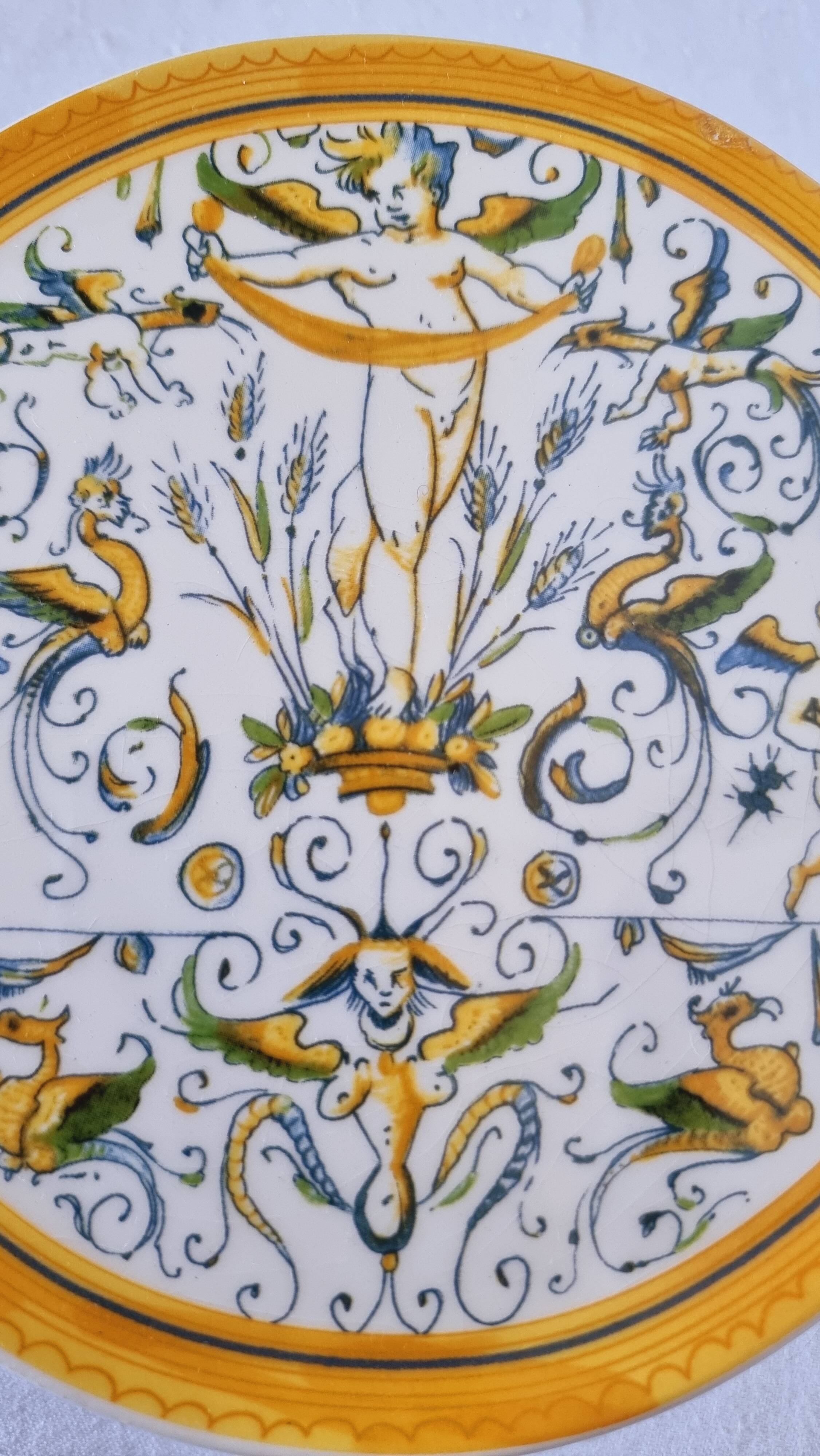 Vintage Italian raised plate in hand-painted ceramic.