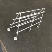Mid-century modern minimalist metal coat rack from the 1960s.