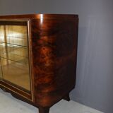 Art Deco period silverware in walnut