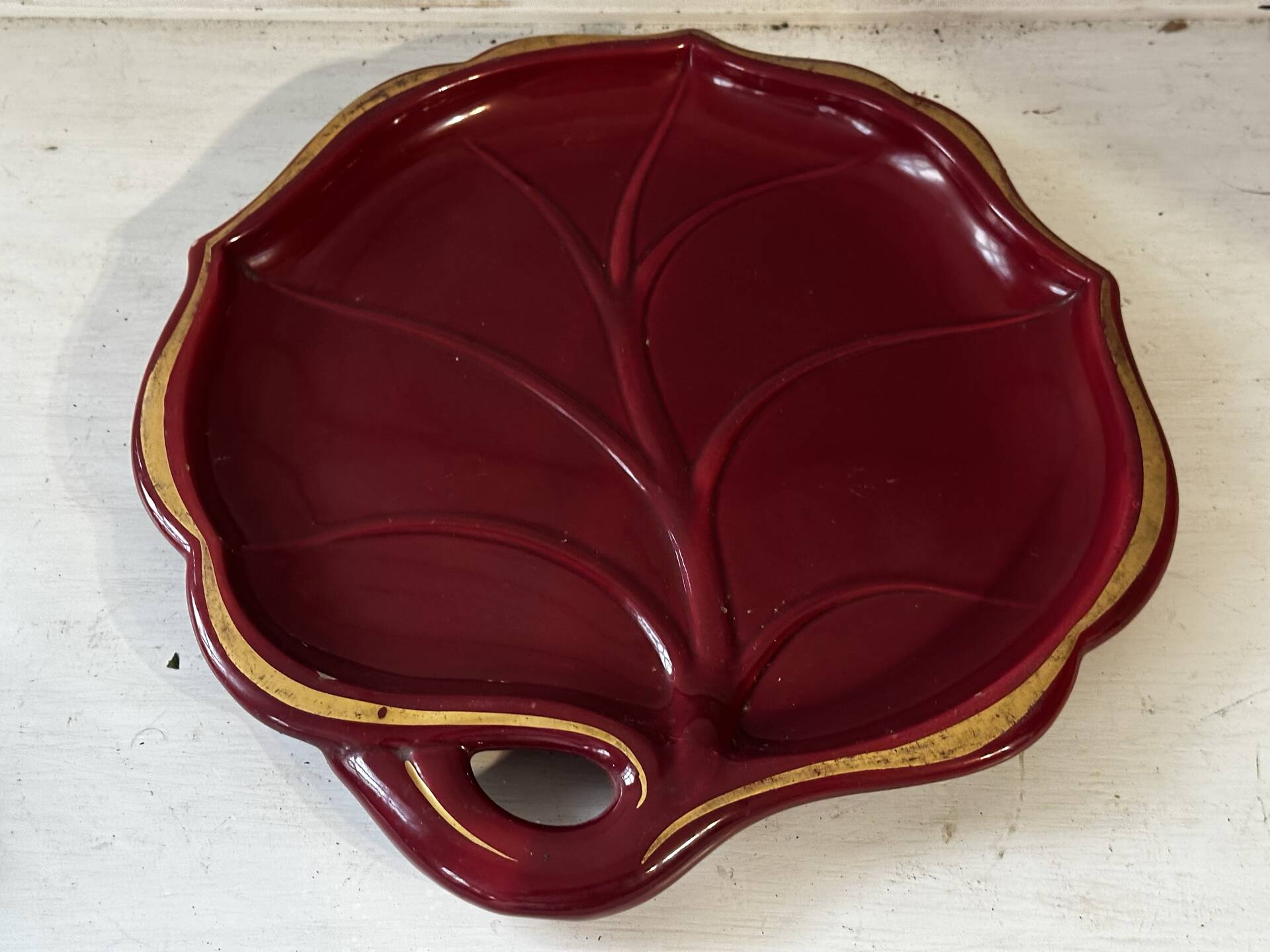 Mid-Century catchall in ruby red ceramic with gold trim – shape