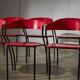 Red Plywood and Curved Metal Frame Chair