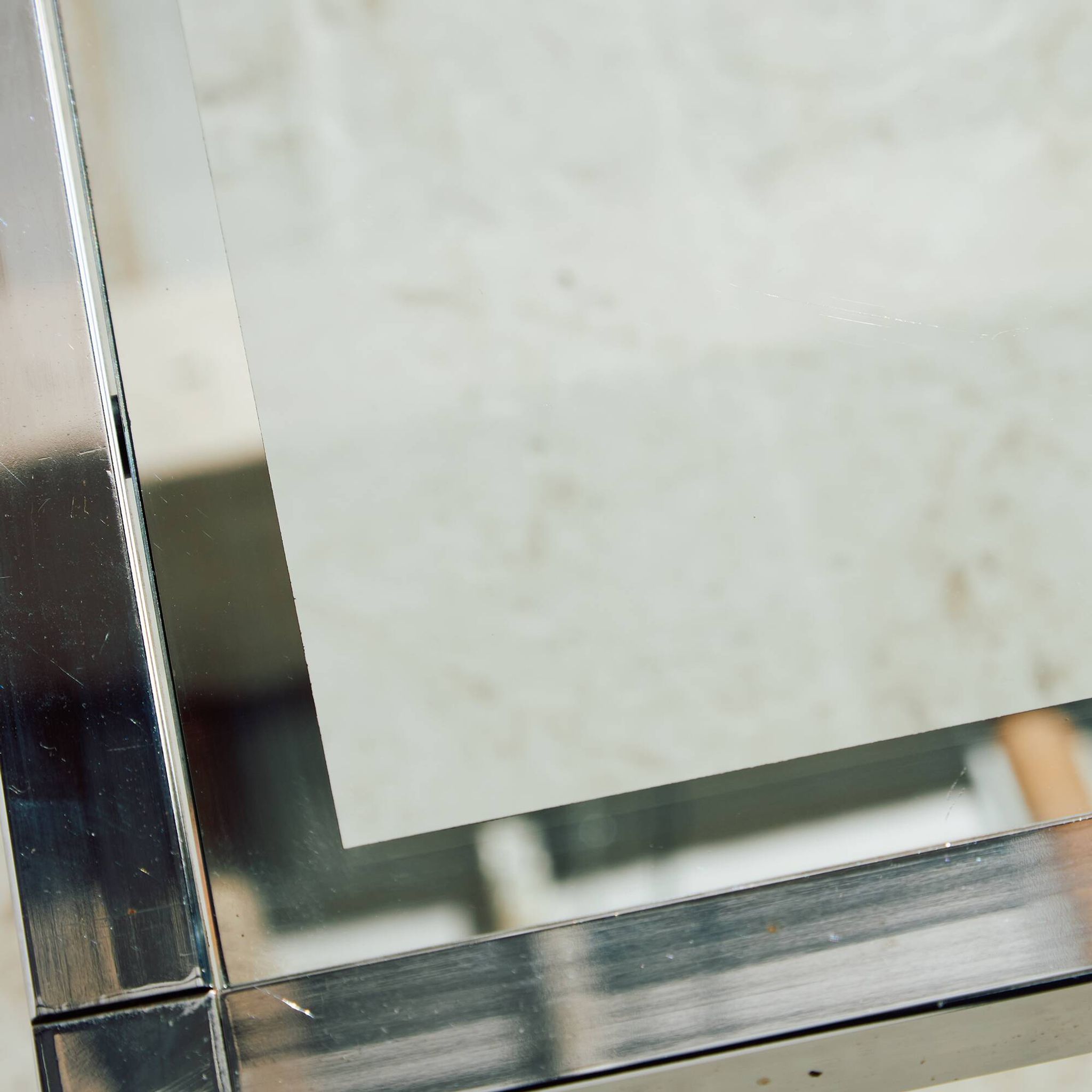 Chrome and glass coffee table.