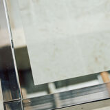 Chrome and glass coffee table.