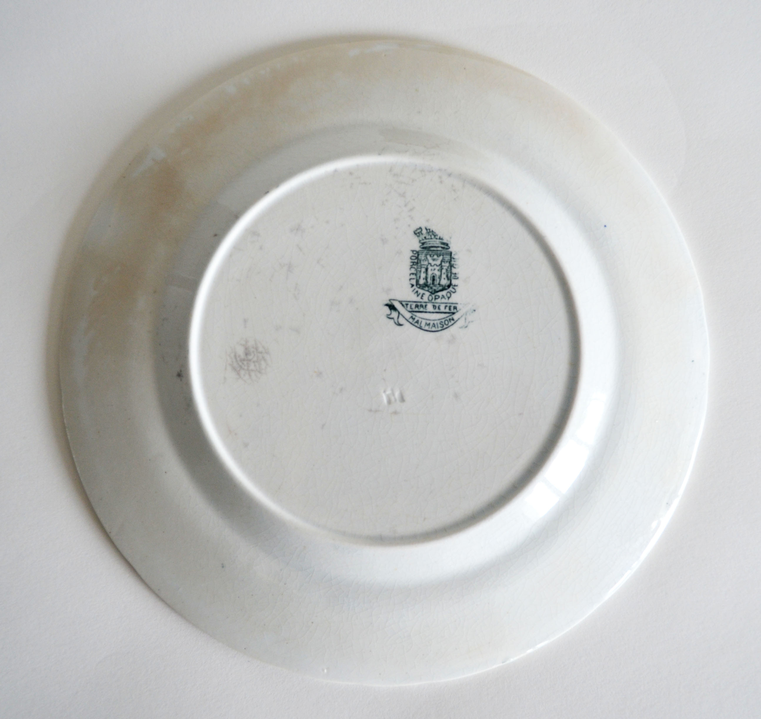 4 mismatched iron earth dessert plates