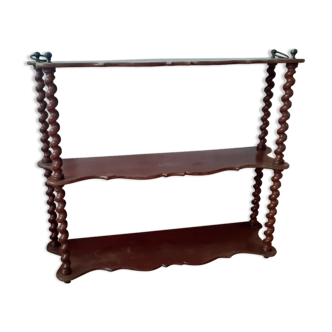 Turned wooden wall shelf
