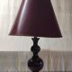 Turned wood table lamp in plum color - 1970s