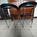 Pair of black and chrome leather Italian armchairs