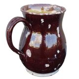 Pichet ancien en faïence française brune à intérieur émaillé jaune