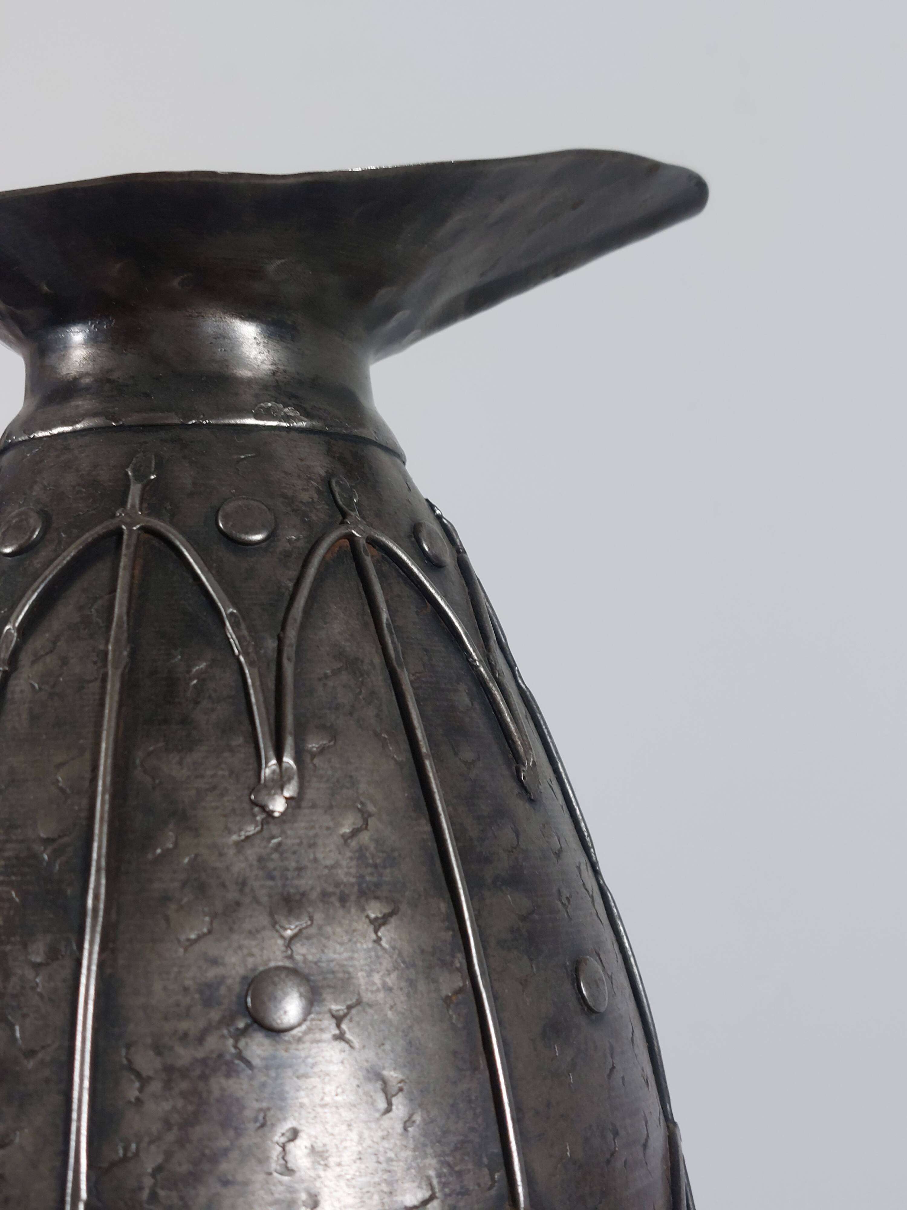 Rare hand-forged metal pitcher and craftsmanship from France.