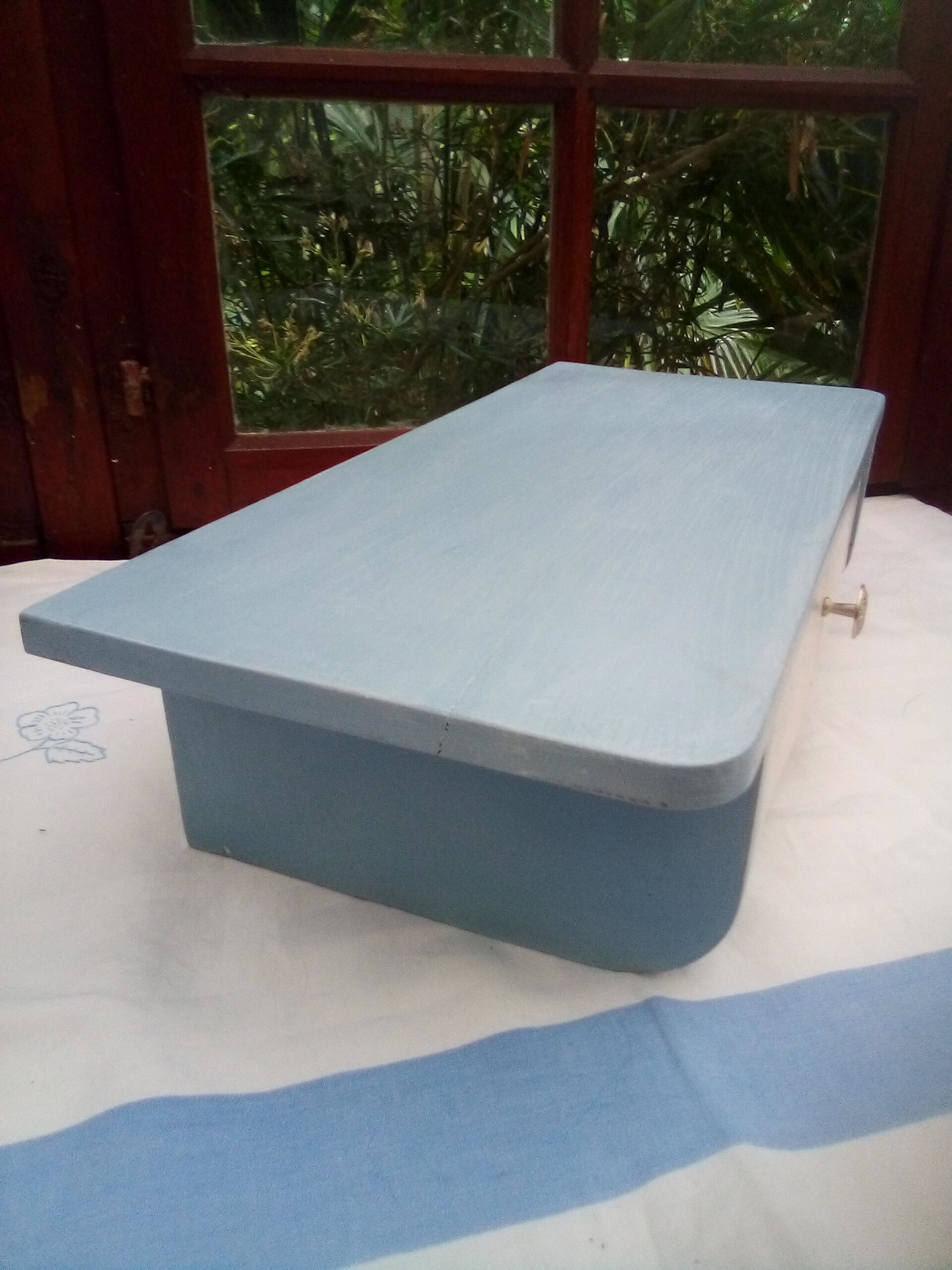 Old wooden shelf with drawer