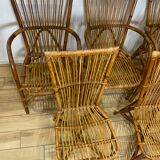 3 armchairs and two bent rattan chairs Audoux & Minnet