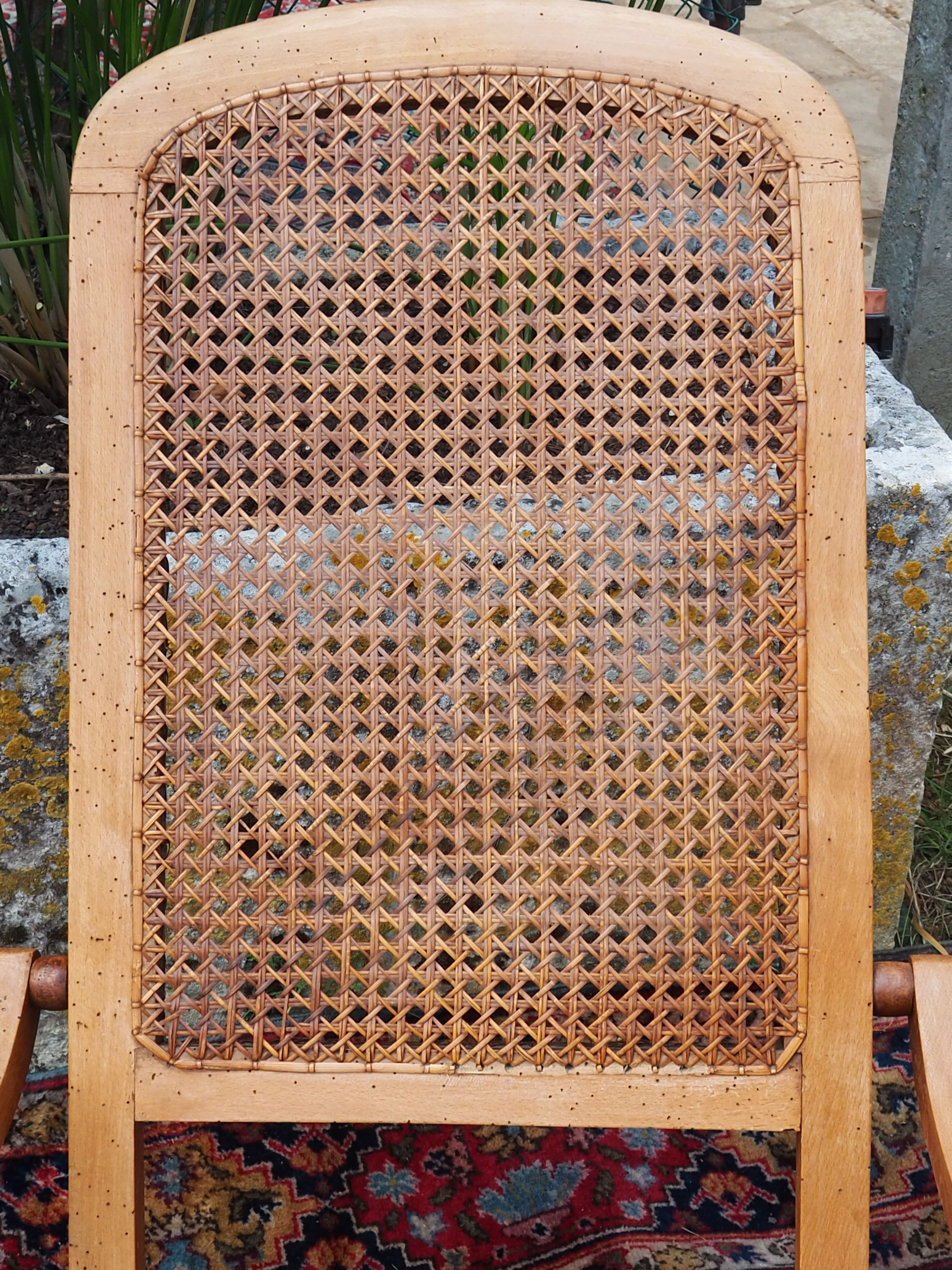 Cane folding armchair in solid wood