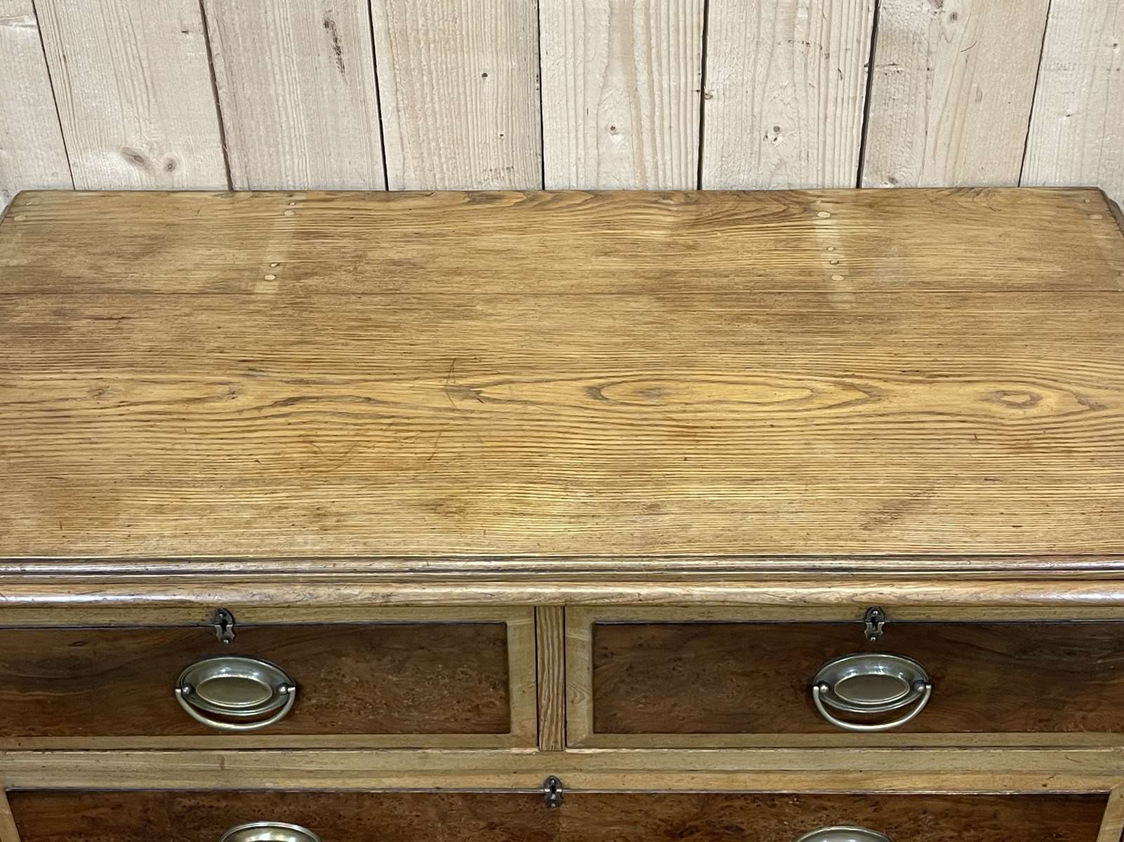 English chest of drawers in frene and nineteenth yew magnifying glass