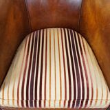 Set of 2 cognac-colored sheepskin club chairs with colorful fabric cushions