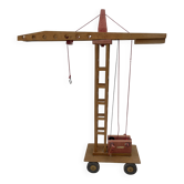 Vintage wooden crane toy from the 60s